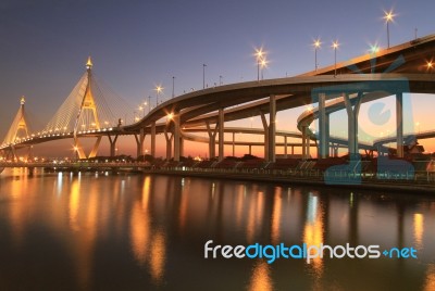 Night View Of Bhumibol Bridge In Thailand, Also Known As The Industrial Ring Road Bridge Stock Photo