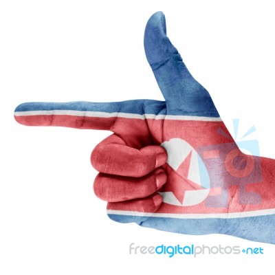 North Korea Flag On Hand Stock Photo