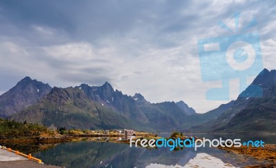 Norway Island In Fjord. Cloudy Nordic Day. Hotel On Island Stock Photo