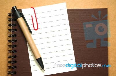Note Paper Clip On Notebook With Pen Stock Photo