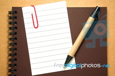 Note Paper With Pen Stock Photo