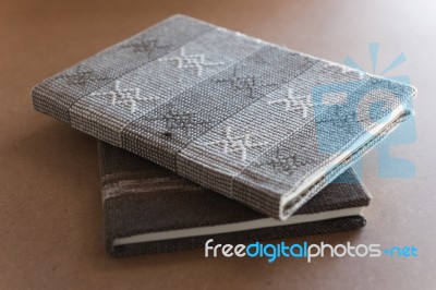 Notebook On Grunge Wooden Background Stock Photo