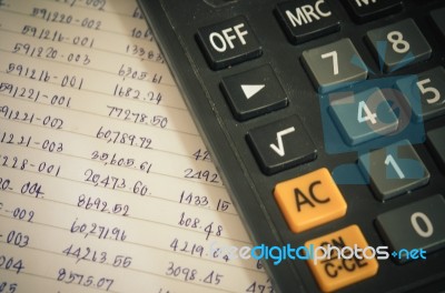 Numbers And Financial Calculator Stock Photo