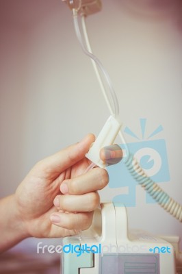 Nurse's Hands Regulation An Intravenous (iv) Drip In Hospital Ro… Stock Photo