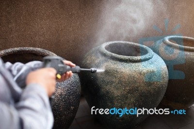 Object Cleaning With High Pressure Water Cleaner Stock Photo