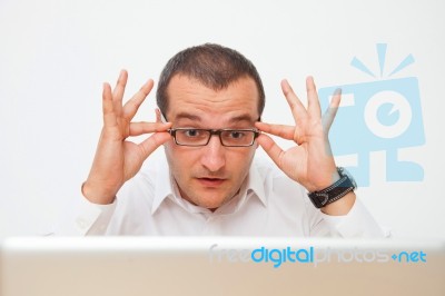 Office Worker With Laptop Stock Photo