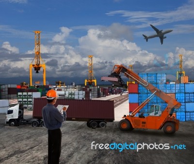 Officer Man Working In Land Transport Logistic With Container Do… Stock Photo