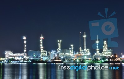 Oil Refinery In The Night Stock Photo