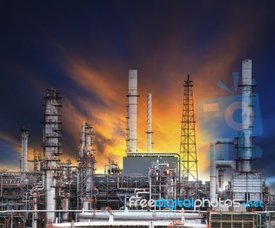 Oil Refinery Plant In Heavy Industry Estate Against Beautiful Du… Stock Photo