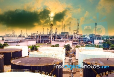 Oil Refinery Plant In Heavy Industry Estate Against Beautiful Du… Stock Photo
