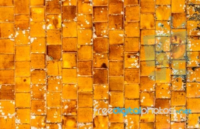Old And Dirty Orange Mosaic Tiles Stock Photo