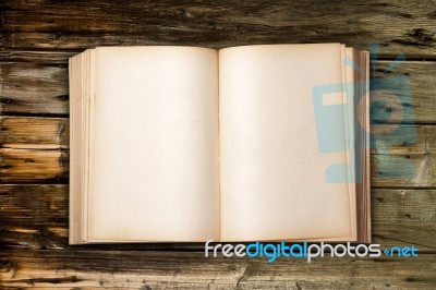 Old Antique Book On Wood Table Stock Photo