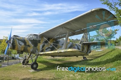 Old Antonov An-2 Military Aircraft Camouflaged Stock Photo