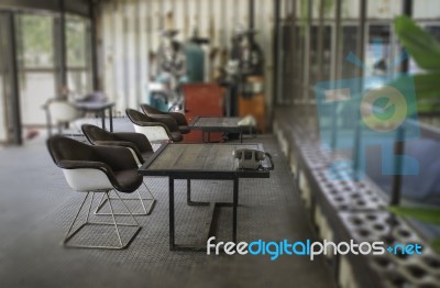 Old Arm Chairs And Wooden Table Interior Stock Photo