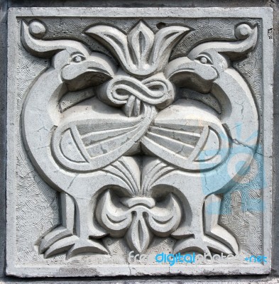 Old Bas-relief Of Fairytale Two Firebirds Stock Photo