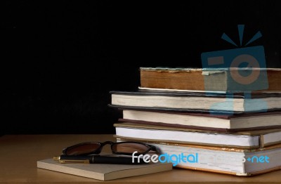 Old Book On Wooden Table Stock Photo