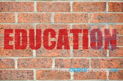 Old Brick Wall Texture With Education Inscription Stock Photo