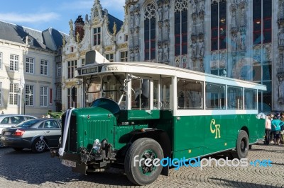 Old Bus In Market Square Bruges Stock Photo