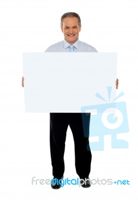 Old Businessman Holding Blank Board Stock Photo