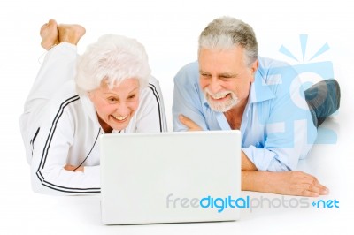 Old Couple Laptop Stock Photo