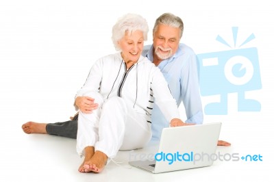 Old Eldery Couple With Laptop Stock Photo