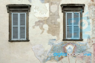 Old Faded Mural On A Wall In Citta Alta Bergamo Stock Photo