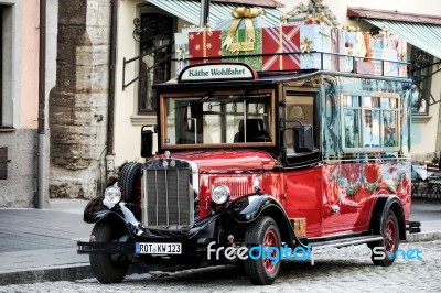 Old Fashioned Red Bus In Rothenburg Stock Photo