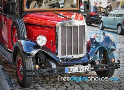 Old Fashioned Red Bus In Rothenburg Stock Photo