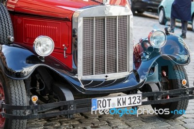 Old Fashioned Red Bus In Rothenburg Stock Photo