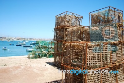Old Fishing Cages In The Port Of Cascais, Portugal Stock Photo