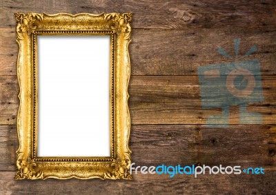 Old Gold Picture Frame On Wooden Background Stock Photo