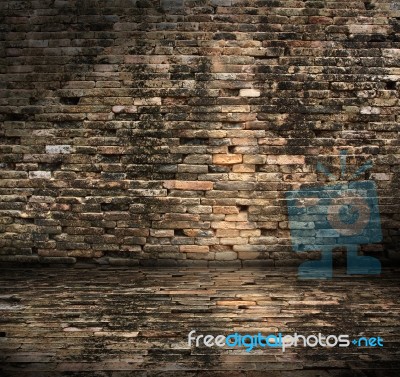 Old Grunge Interior With Brick Wall Stock Photo