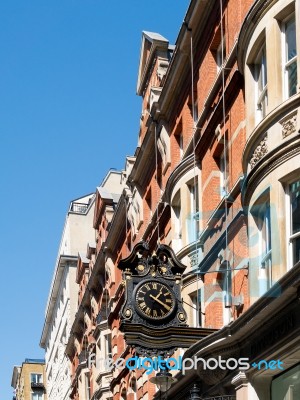 Old Ornate Clock On A Building In London Stock Photo