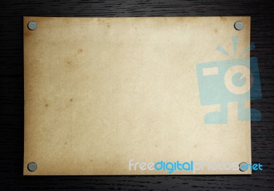 Old Paper On Wooden Background Stock Photo