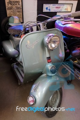 Old Vespa Scooter In The Motor Museum At Bourton-on-the-water Stock Photo