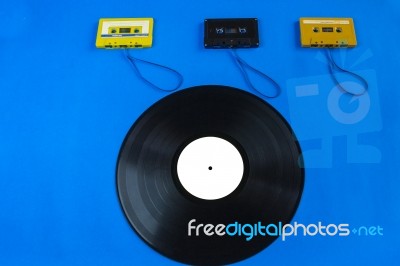 Old Vinyl Records And Tape Cassette Stock Photo