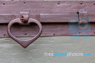 Old Wooden Door Bolt Handle Stock Photo