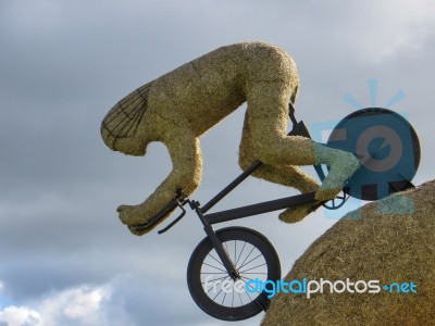 Olympic Cyclist Straw Sculpture Stock Photo