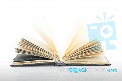 Open Black Book With Shadow On White Background Stock Photo