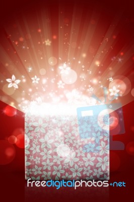 Open Magic Gift Box With Red Background Stock Photo