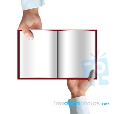 Opened Book In Hand Stock Image