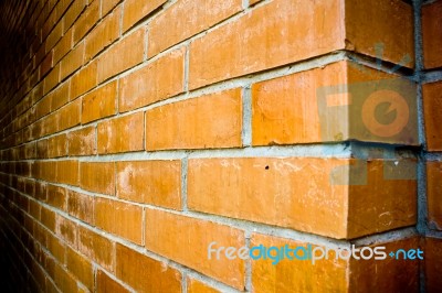 Orange-Brown Brick Wall Stock Photo