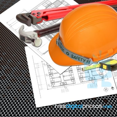 Orange Helmet Of Relate Or Rescue Constructor With Blueprints Stock Photo