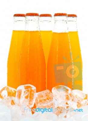 Orange Juice In Five Bottle Stock Photo