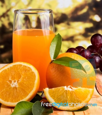 Orange Juice Squeezed Means Citrus Fruit And Drinks Stock Photo