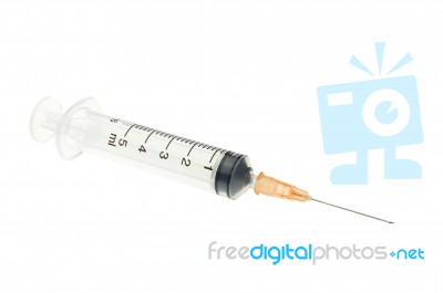 Orange Syringe Isolated On White Background Stock Photo