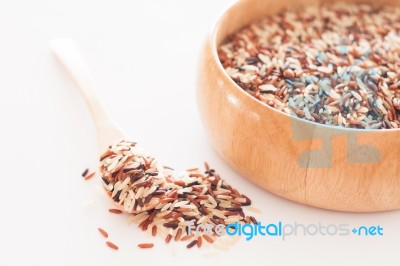 Organic Dry Multi Grain Rice In Wooden Bowl Stock Photo