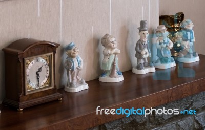 Ornaments And Clock On 1950s Mantelpiece Stock Photo