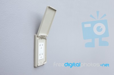 Outdoor Electrical Outlet With Cover On Cement Wall Stock Photo