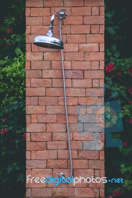 Outside Large Chrome Shower At Swimming Pool Area Stock Photo